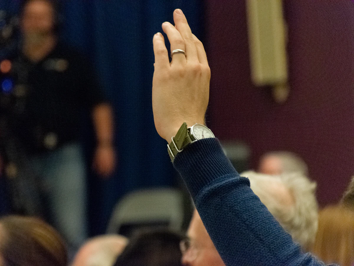 Raised hand taking an oath