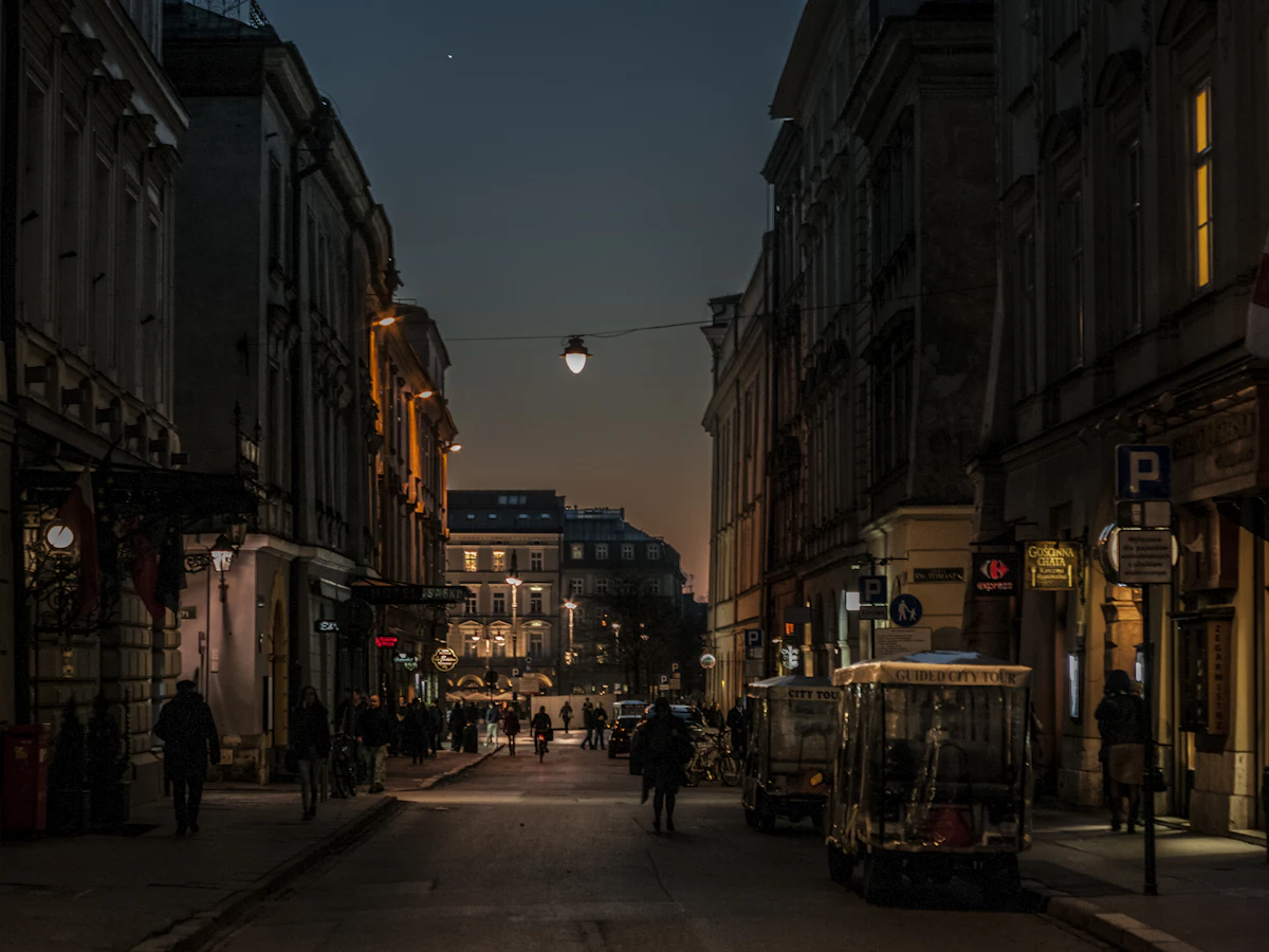 City street in the evening with lights on