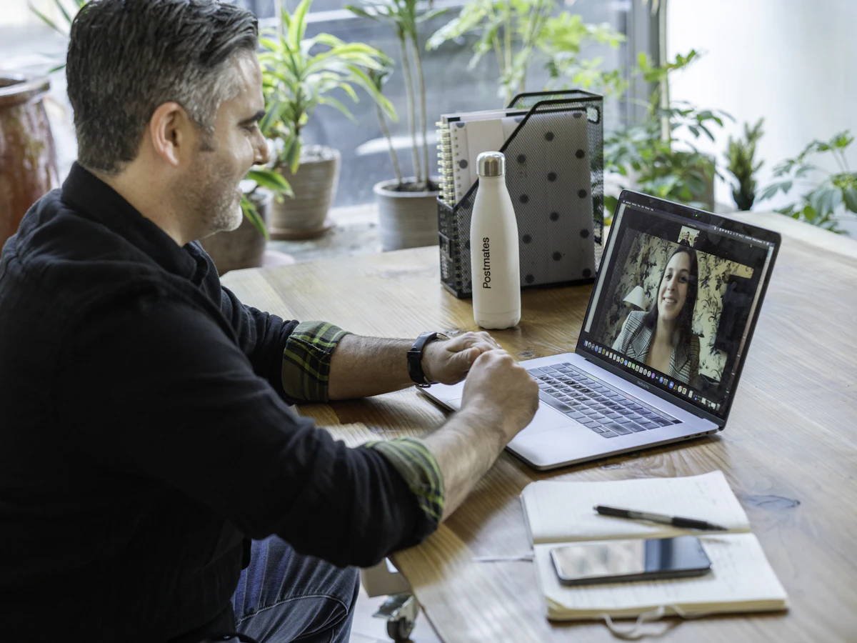 Man on a video call at his laptop