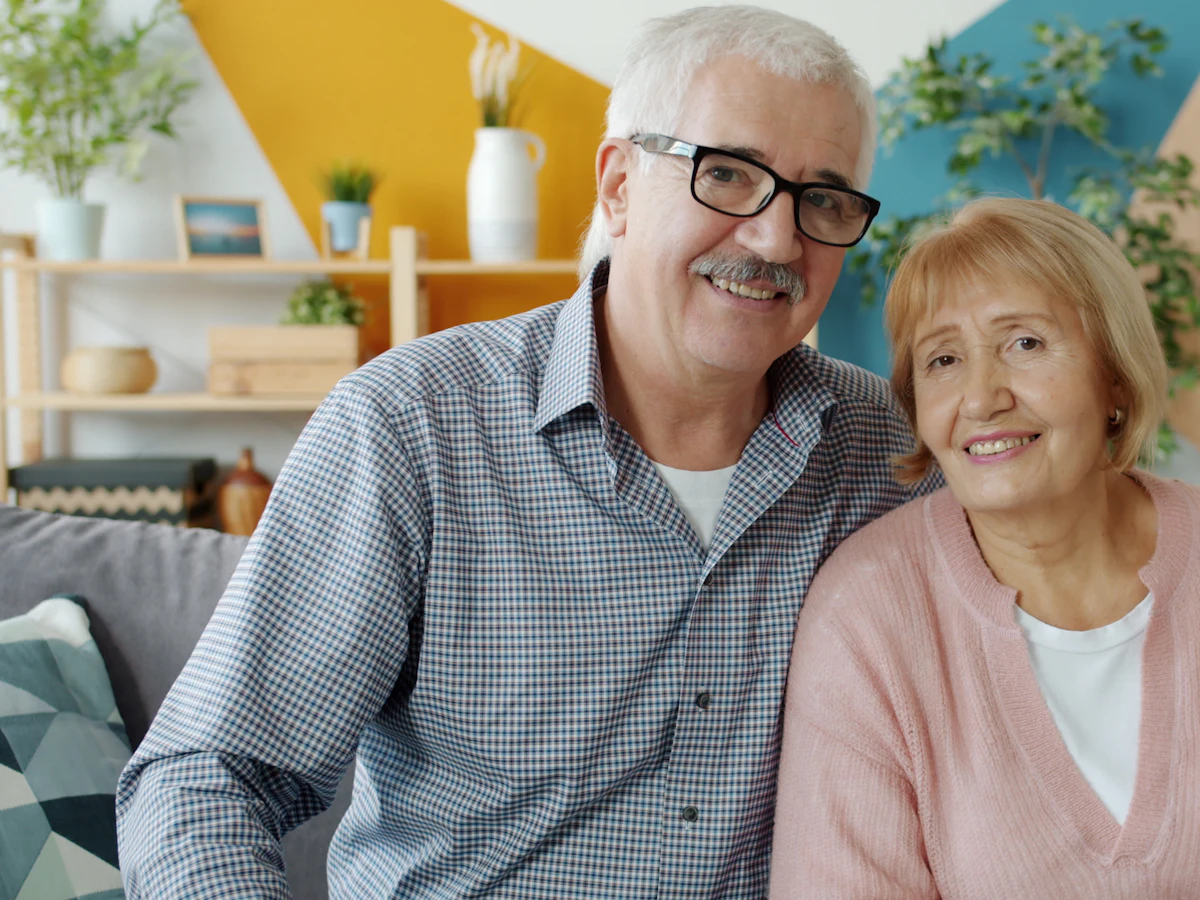 Smiling senior couple at home